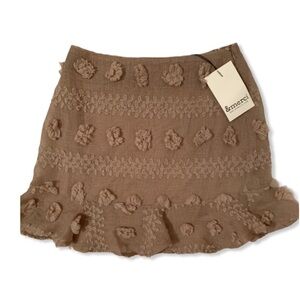 Merci NWT Mini Skirt tan, size Medium Swiss Dot, Pom‎ Pom Super Cute Skirt!
